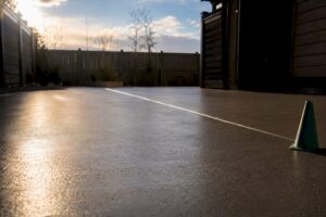 Freshly sealed concrete patio curing outdoors